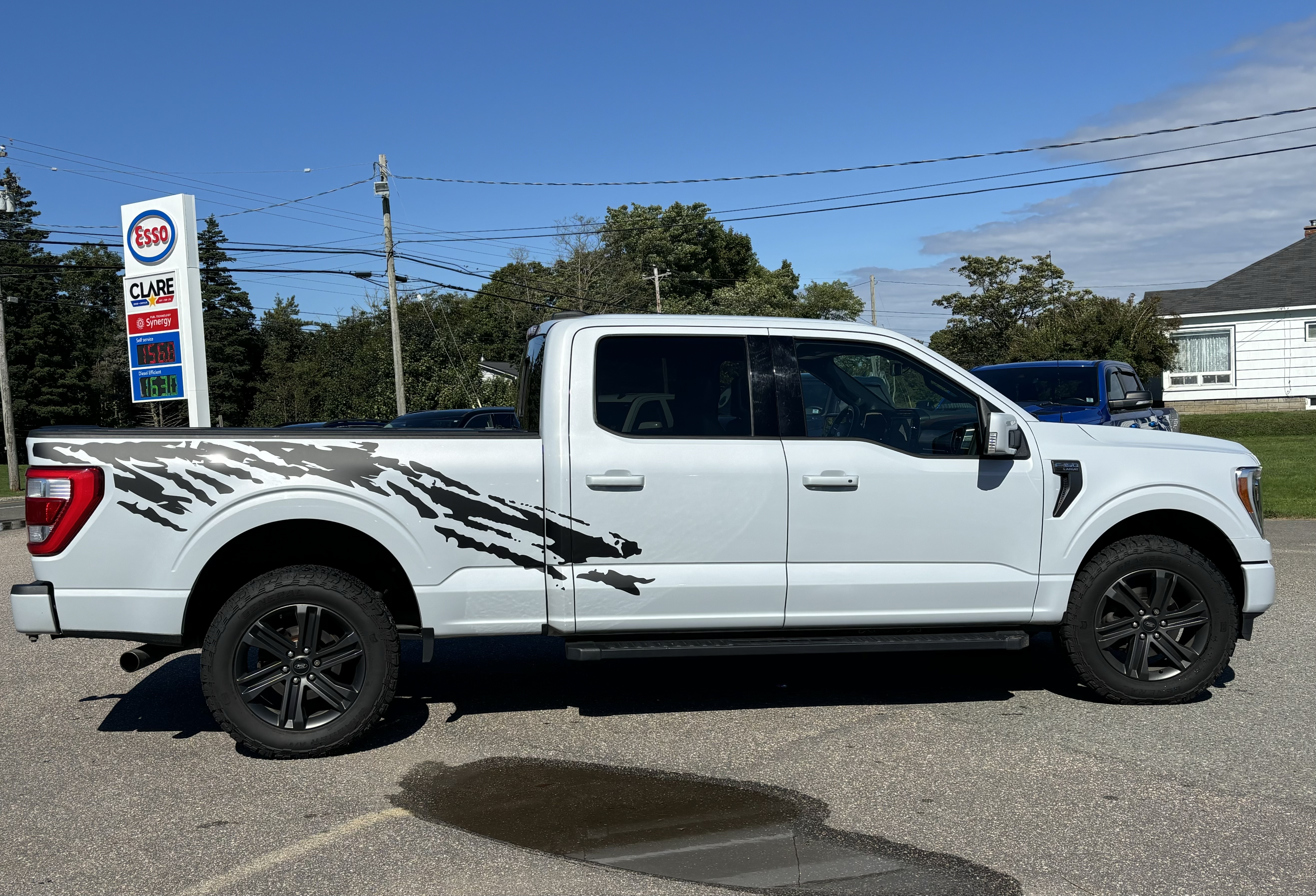 Ford F-150 with custom splash graphics by Bayside Graphics